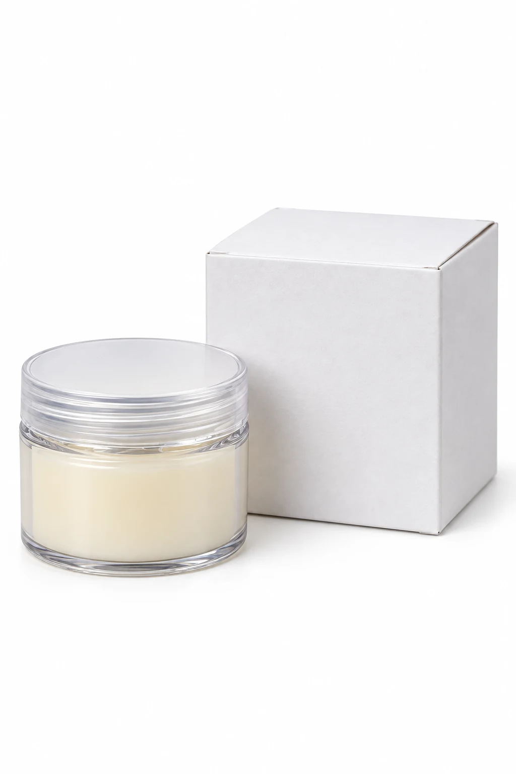 Grease jar beside a square paperboard carton