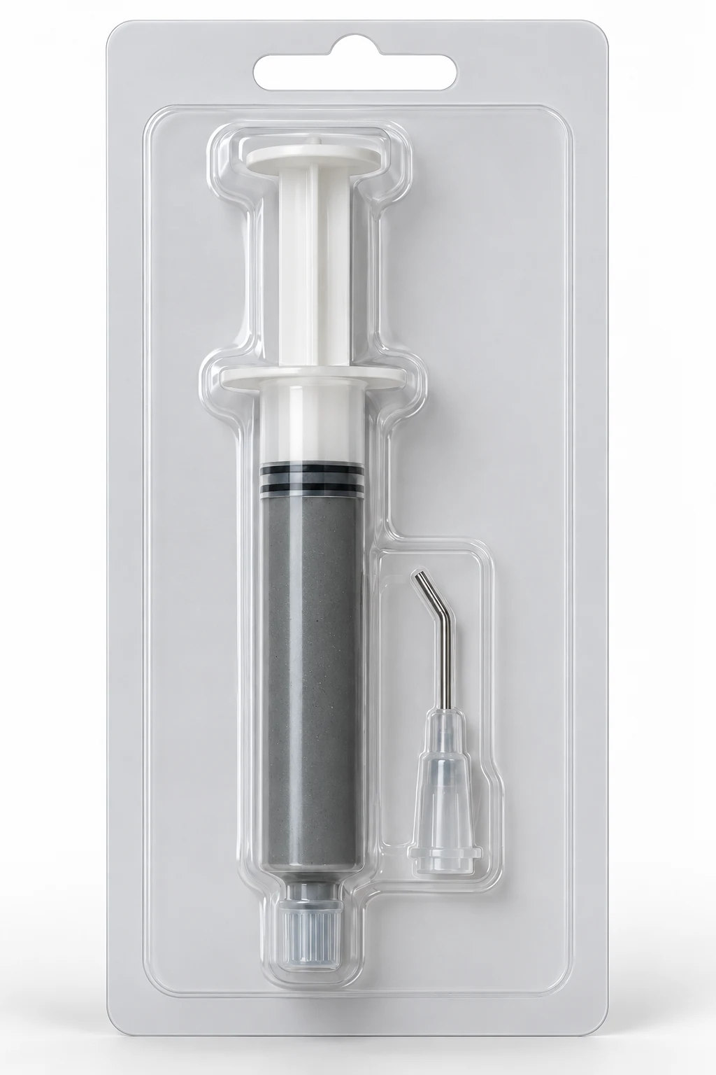 Large grease syringe and bent applicator tip in a clear retail blister pack
