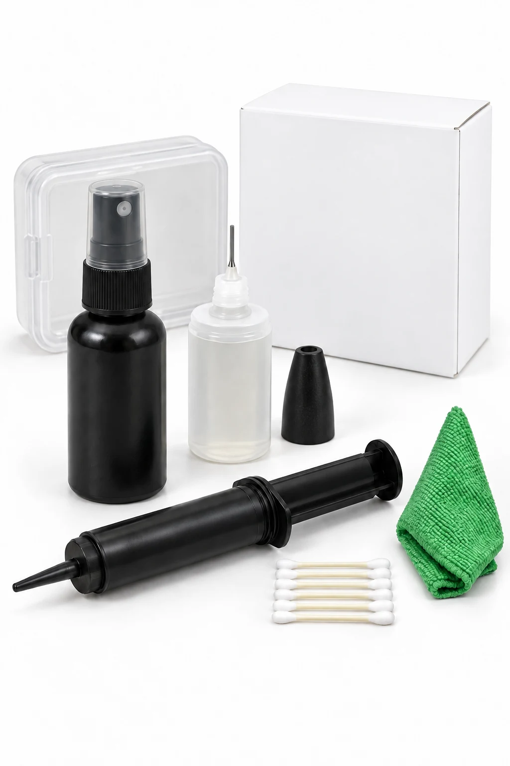 Unbranded reel care kit with grease syringe, oil bottle, cleaning spray, cloth and swabs