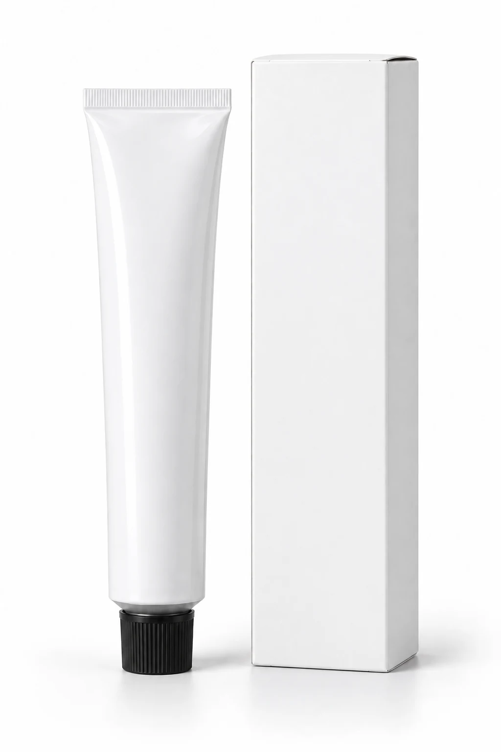 Upright grease squeeze tube beside its matching retail carton